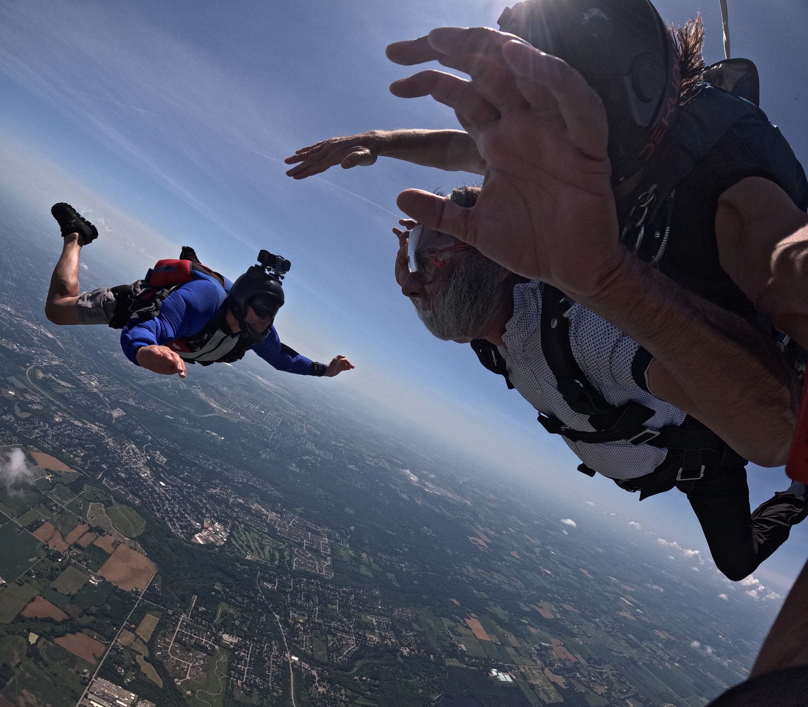Skydivers mid-freefall above Ontario